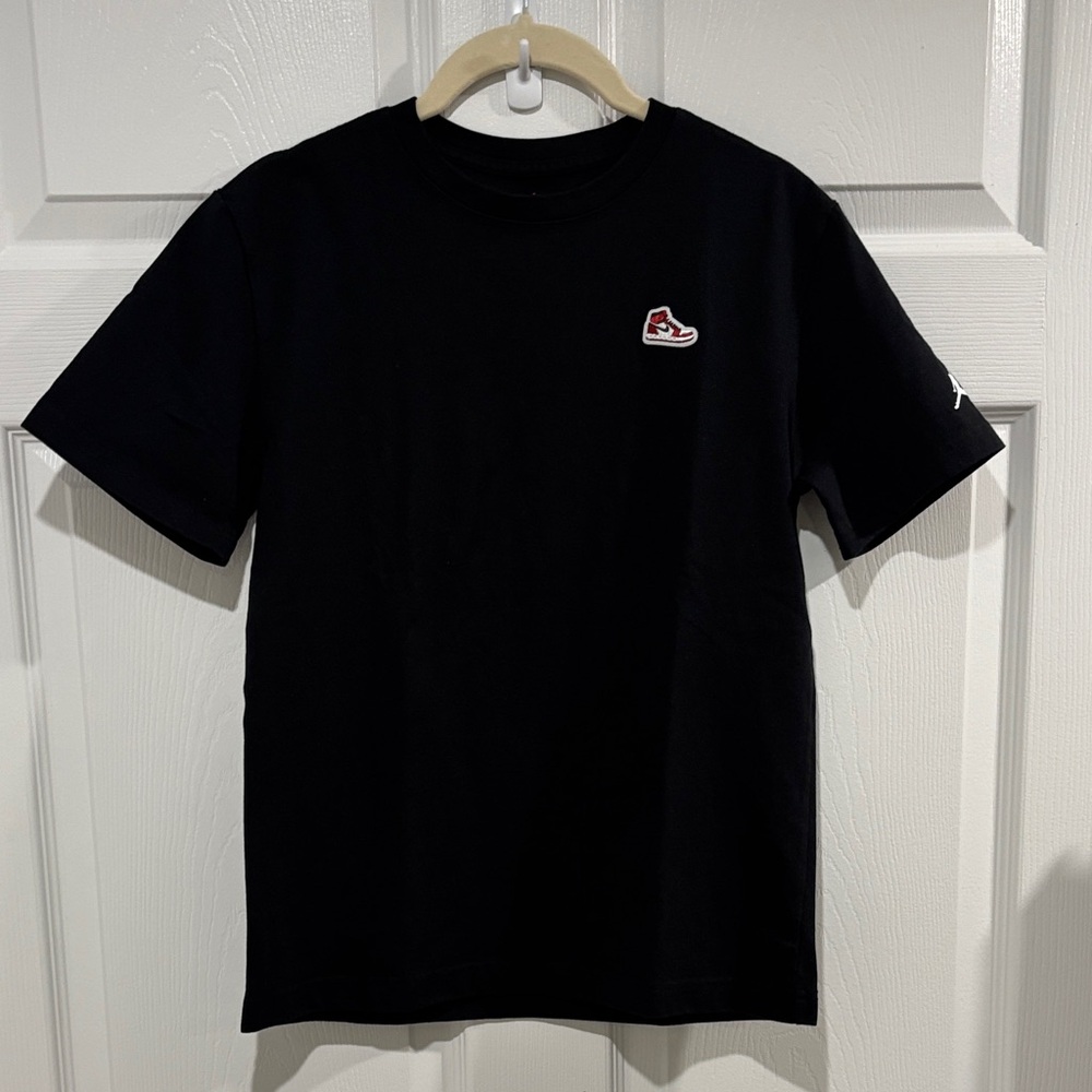 Jordan Black Tee with Red Shoe Accent